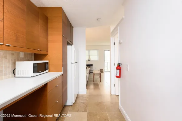 a view of a kitchen with a sink