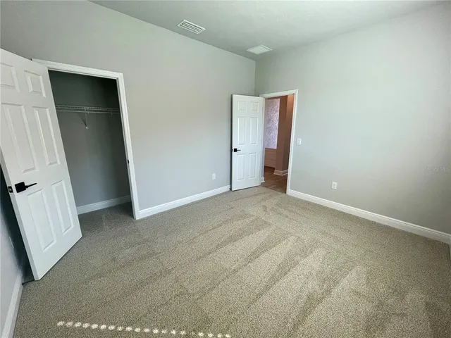 an empty room with closet