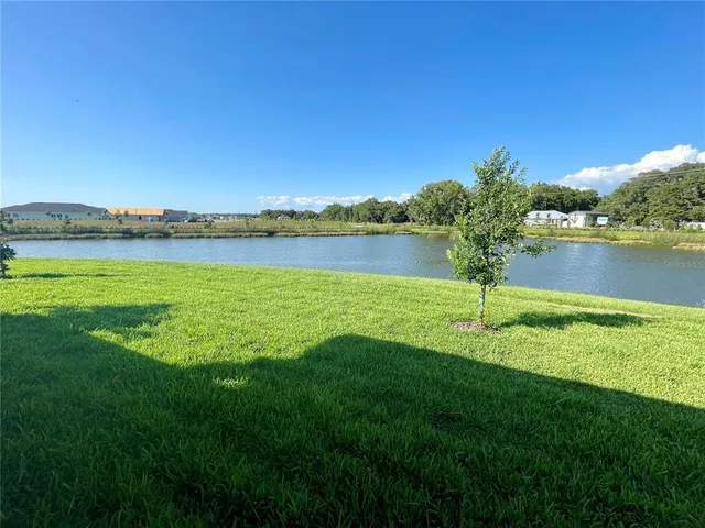 a view of a lake with a lake in the background