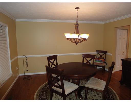 5003 Venice Road Pittsburgh, PA 15209 - Photo 8 of 18 Dining Room. Lovely dining room with new hardwood, light fixture, crown molding and chair rail.