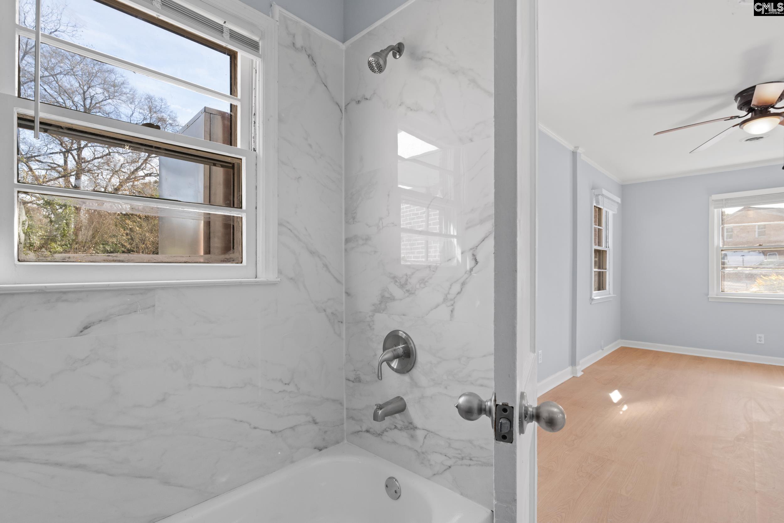 409 Wilkes Road Columbia, SC 29203 - Photo 25 of 34 a bathroom with a bathtub