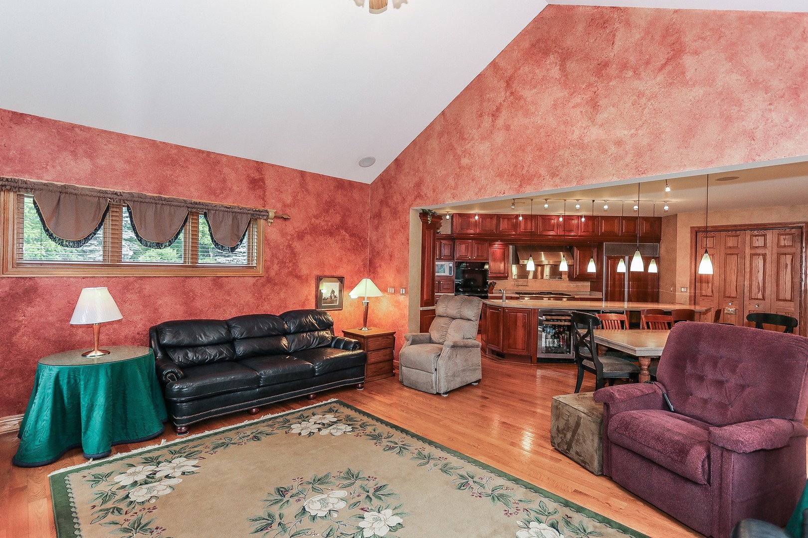 752 Saddle Ridge Crystal Lake, IL 60012 - Photo 15 of 49 a living room with furniture a rug and a fireplace
