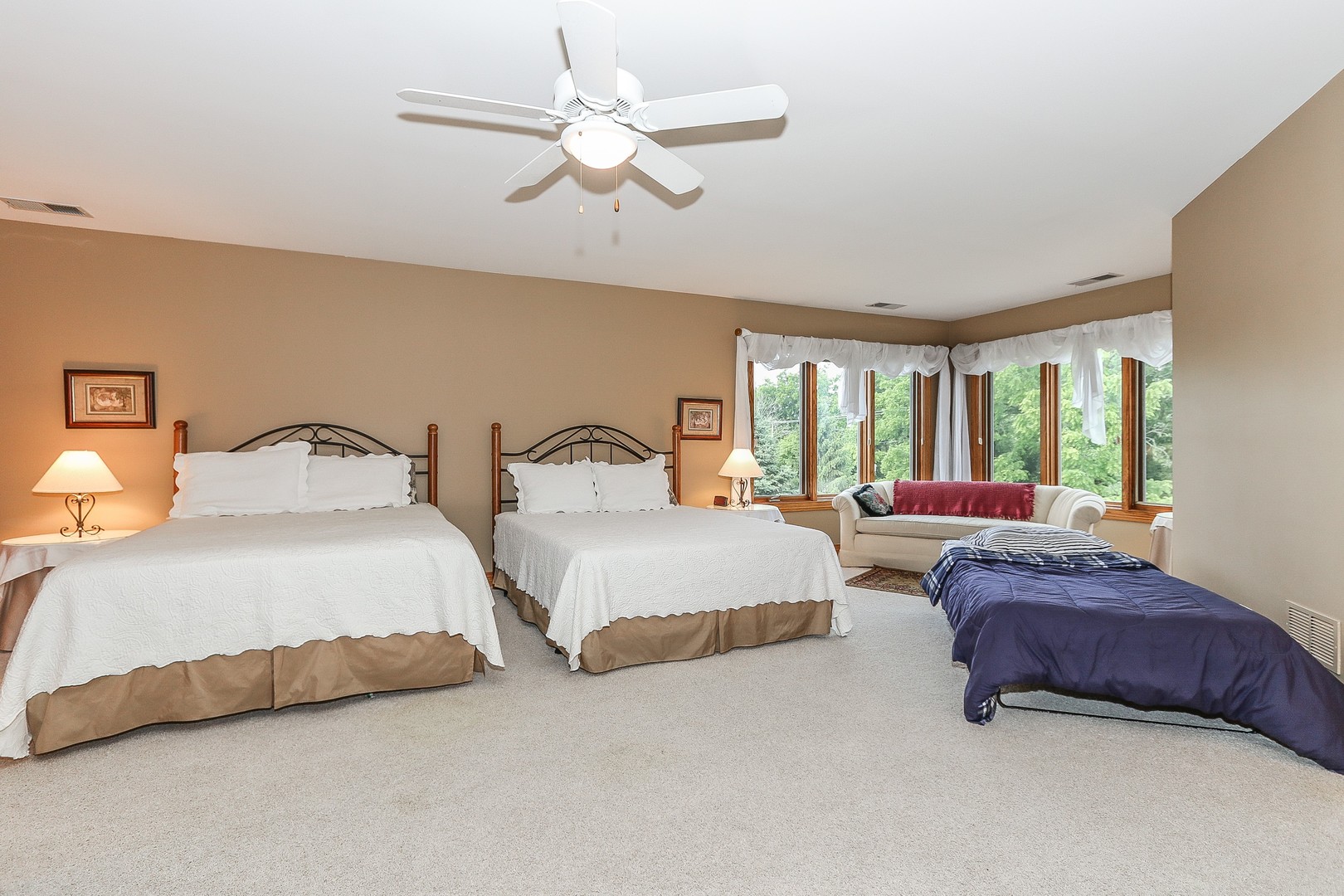 752 Saddle Ridge Crystal Lake, IL 60012 - Photo 32 of 49 a spacious bedroom with two bed and large window