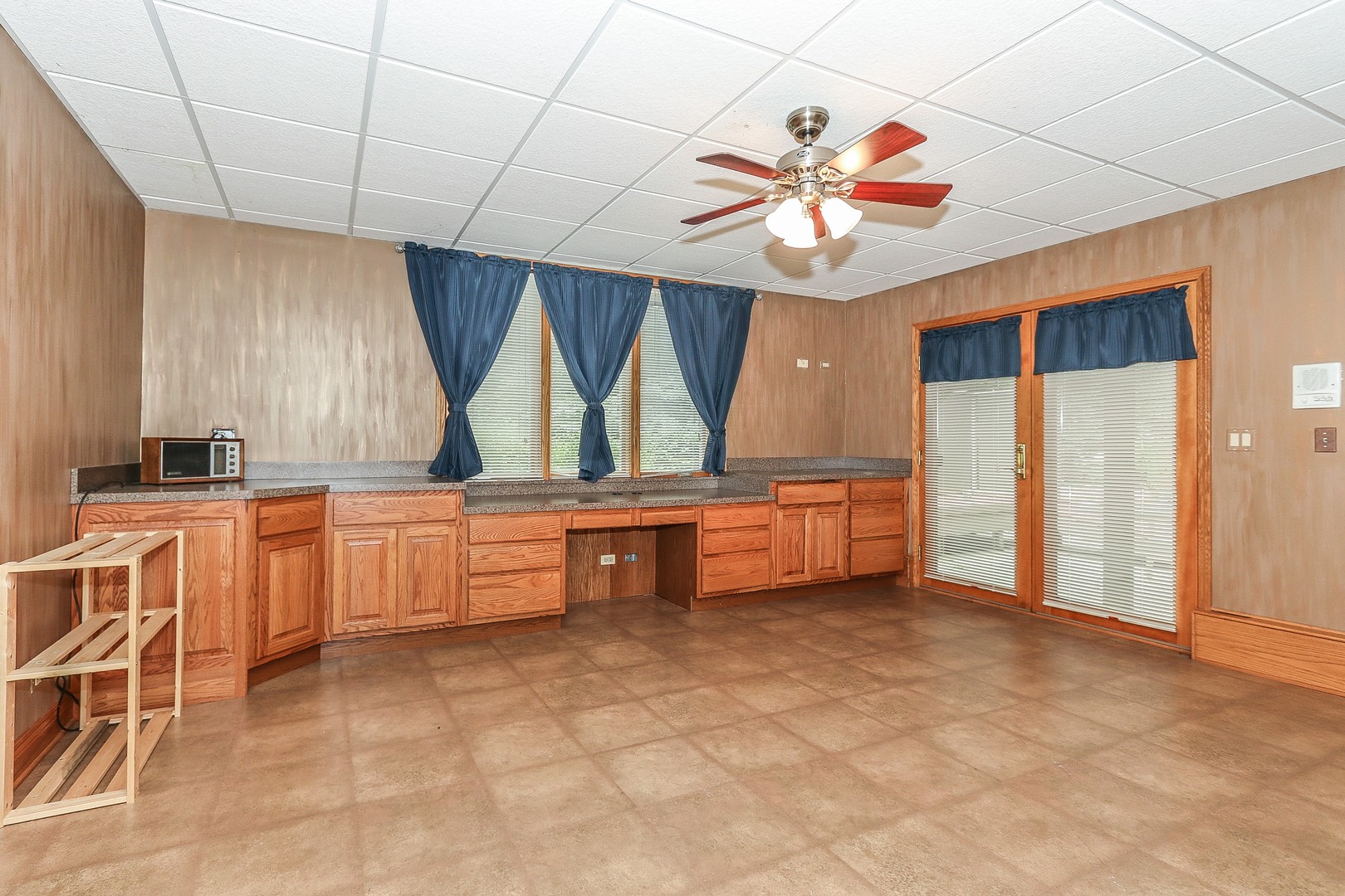 752 Saddle Ridge Crystal Lake, IL 60012 - Photo 38 of 49 a kitchen with granite countertop a sink cabinets and window