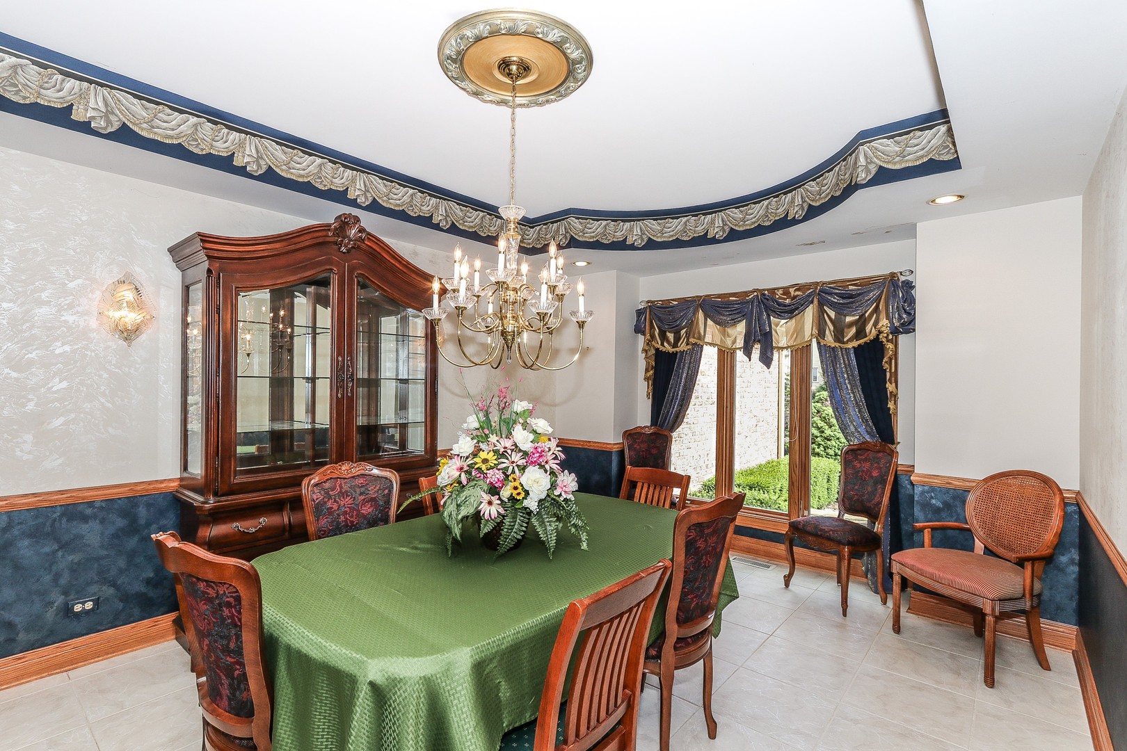 752 Saddle Ridge Crystal Lake, IL 60012 - Photo 6 of 49 a view of a dining room with furniture and chandelier