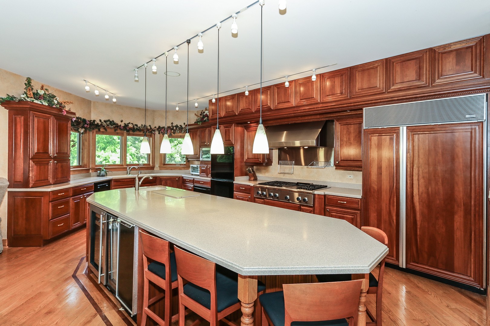 752 Saddle Ridge Crystal Lake, IL 60012 - Photo 7 of 49 a kitchen with stainless steel appliances granite countertop a sink a stove and a refrigerator