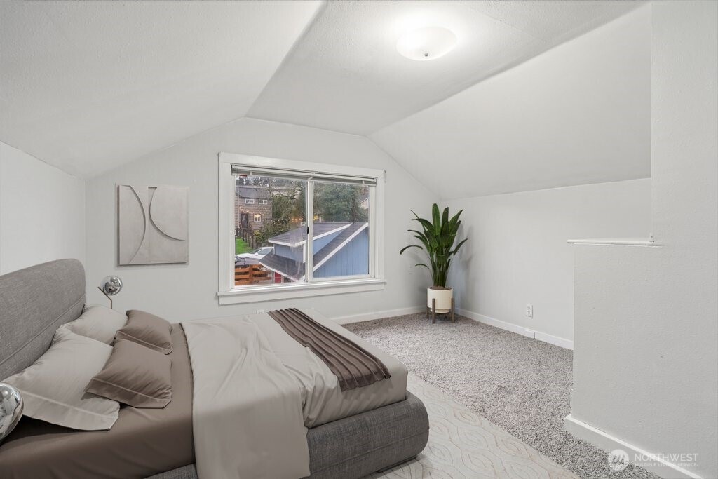 4412 South 3rd Avenue Everett, WA 98203 - Photo 16 of 31 a bedroom with a bed and a window