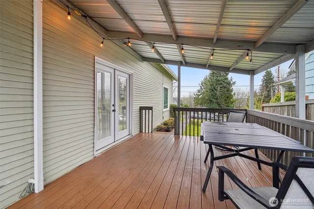a view of a balcony with furniture