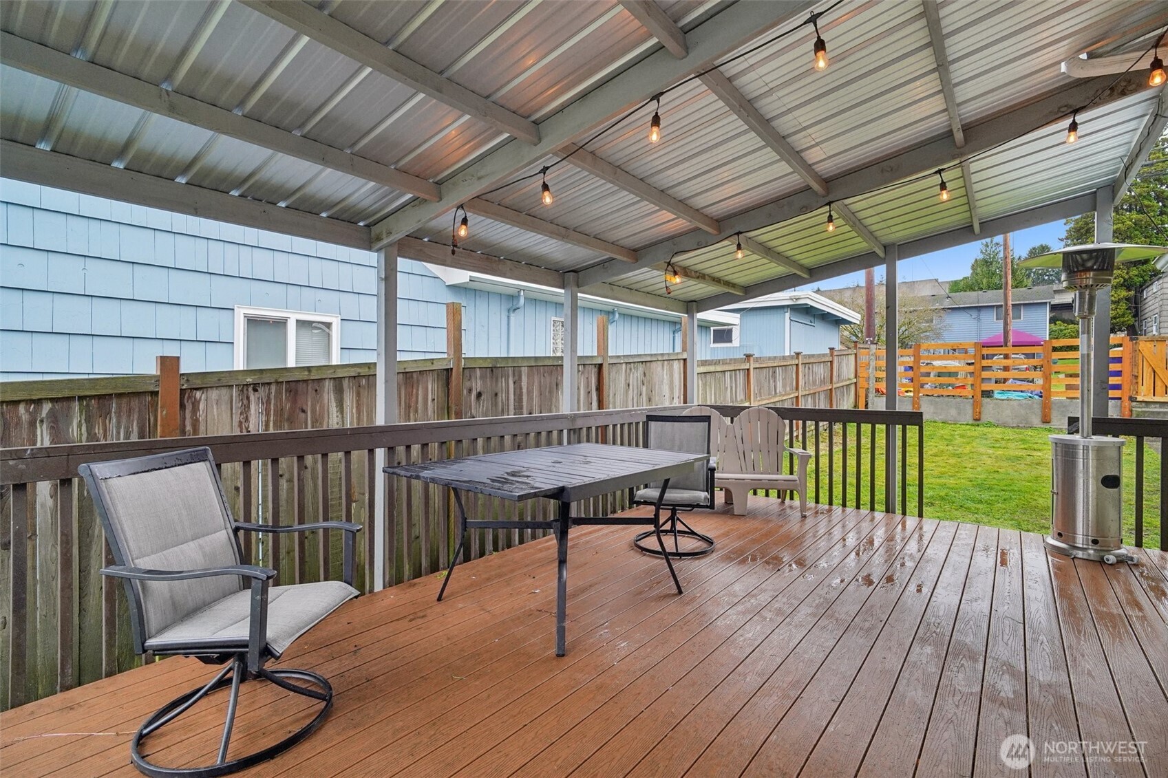 4412 South 3rd Avenue Everett, WA 98203 - Photo 21 of 31 a view of a roof deck with chair and wooden floor