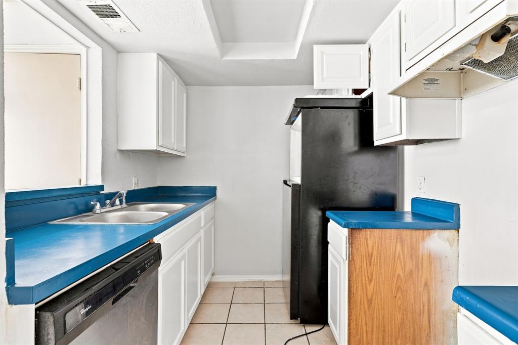 Vacant Unit 13 – Kitchen with Refrigerator and Dishwasher Shown