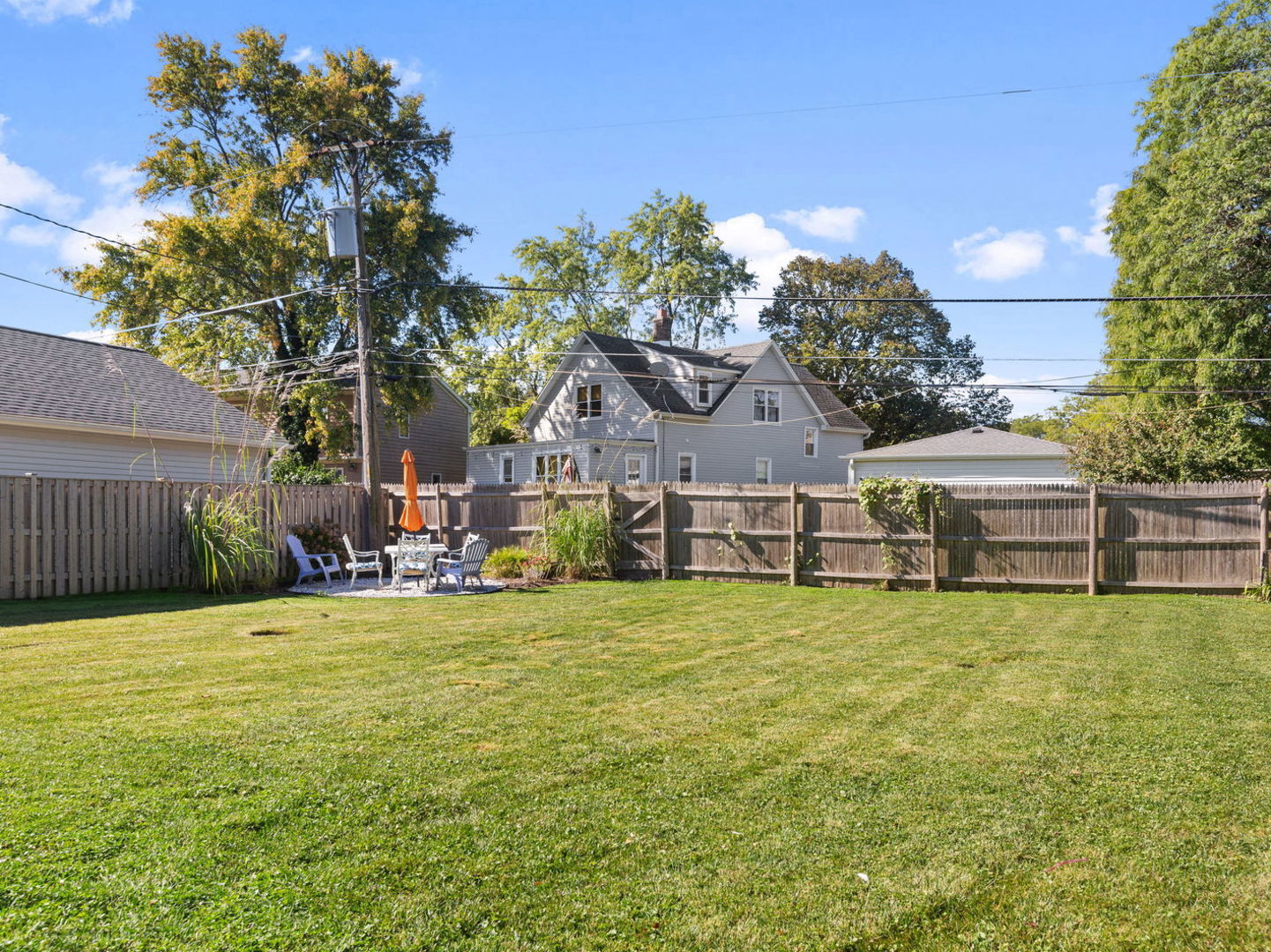 578 Sumac Road Highland Park, IL 60035 - Photo 20 of 28 a view of a house with a yard and a large tree