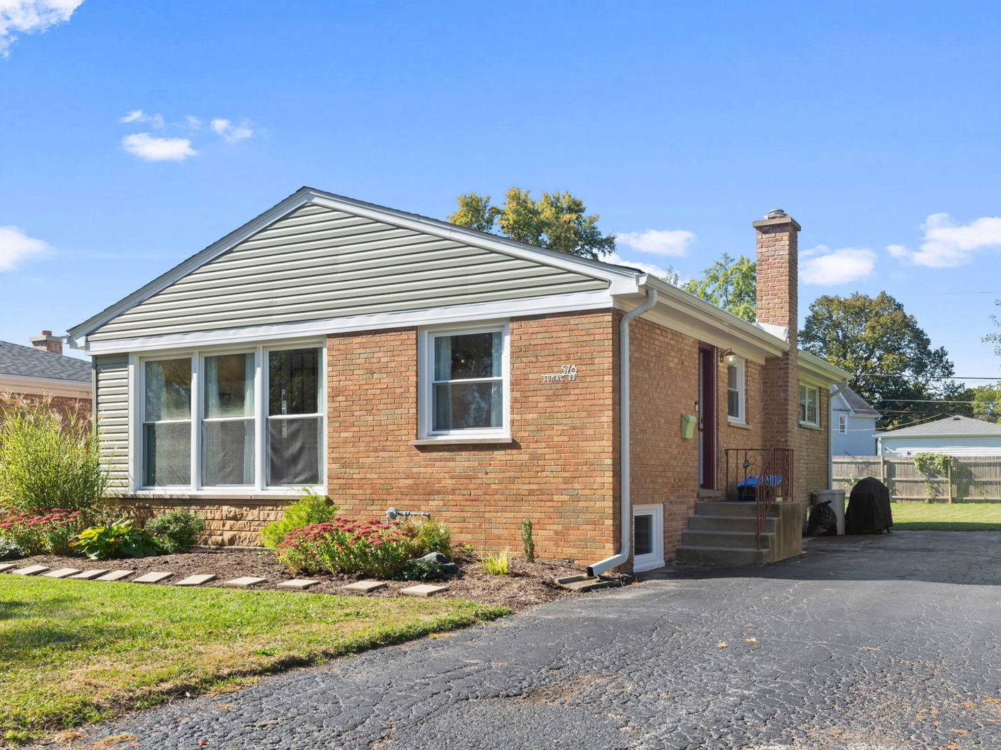 578 Sumac Road Highland Park, IL 60035 - Photo 28 of 28 a front view of a house with a yard and garage