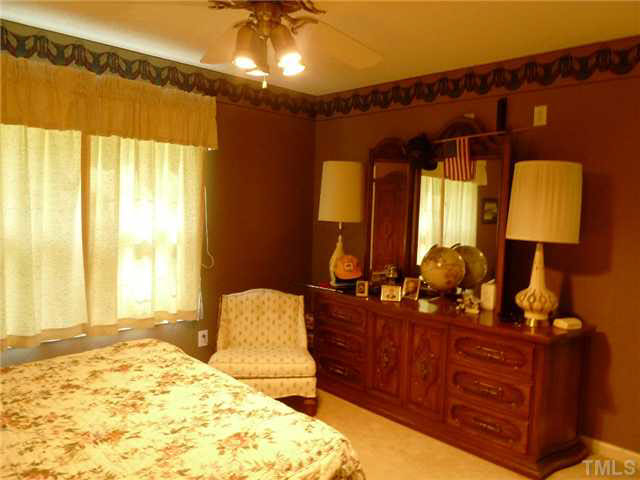 212 Mace Road Mebane, NC 27302 - Photo 11 of 23 View of the master bedroom from the bathroom.