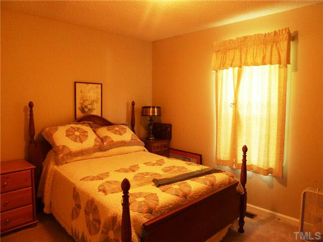 212 Mace Road Mebane, NC 27302 - Photo 13 of 23 One of the two additional bedrooms. Located on the back of the house.