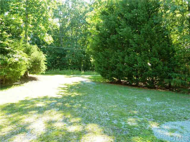 212 Mace Road Mebane, NC 27302 - Photo 20 of 23 This is the view looking out to Mace Rd. from the front yard.