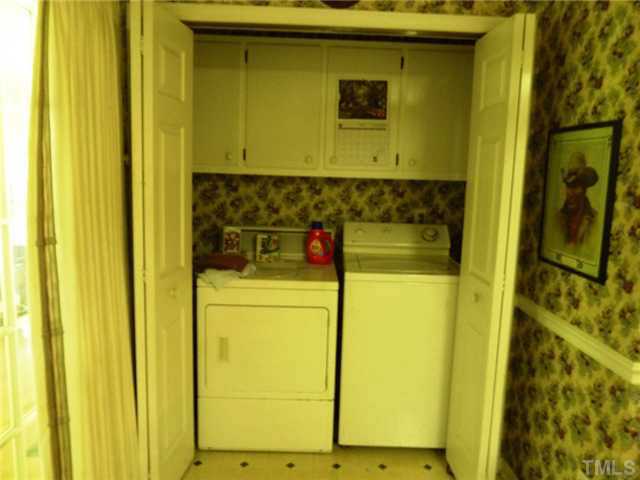 212 Mace Road Mebane, NC 27302 - Photo 21 of 23 Laundry closet off the kitchen. The washer/dryer remain!