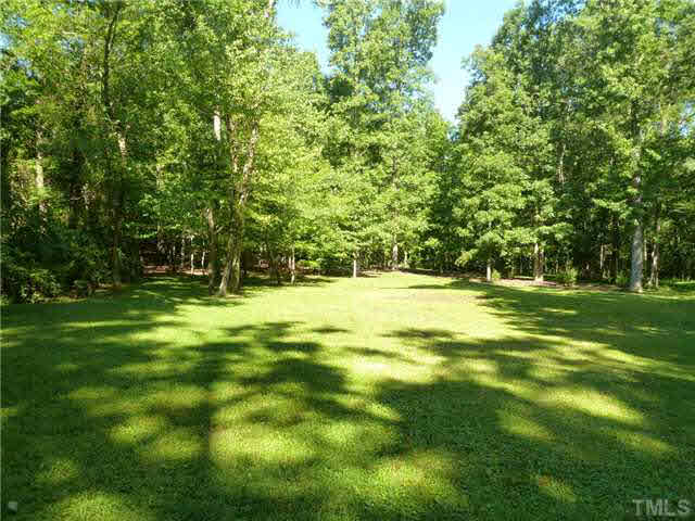 212 Mace Road Mebane, NC 27302 - Photo 4 of 23 This great backyard is a wonderful mixture of part open and partly wooded....with a creek, too!