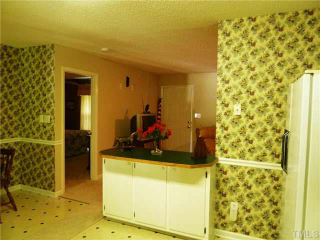 212 Mace Road Mebane, NC 27302 - Photo 5 of 23 This photo is taken from the kitchen looking back into the living room.