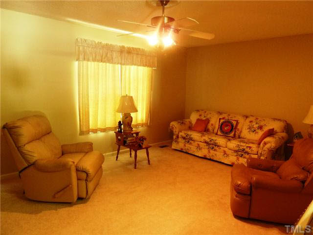 212 Mace Road Mebane, NC 27302 - Photo 7 of 23 View of the large sunny living room from the kitchen.