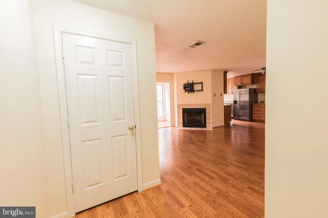 a view of a livingroom with wooden floor