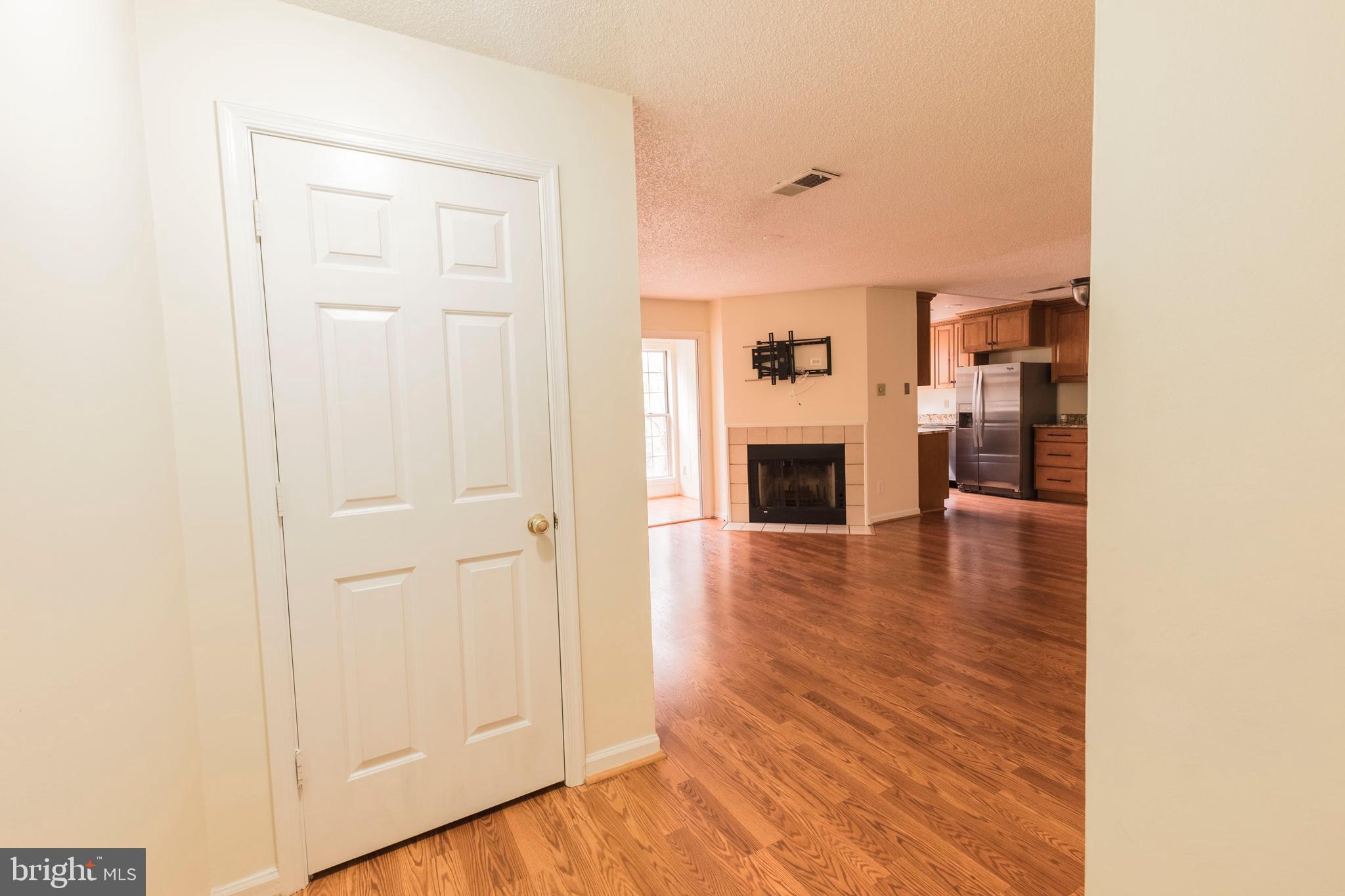 a view of a livingroom with wooden floor