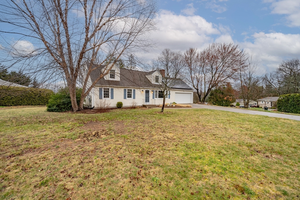 a house view with garden space