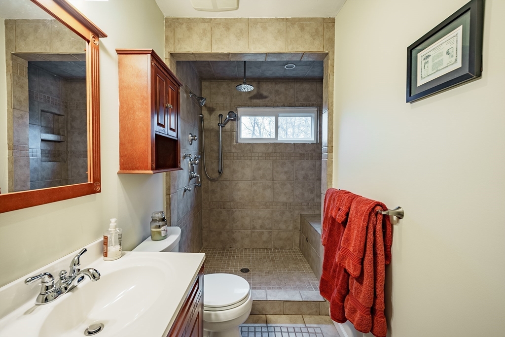 384 Forest Hills Road Springfield, MA 01128 - Photo 12 of 36 a bathroom with a sink toilet and shower