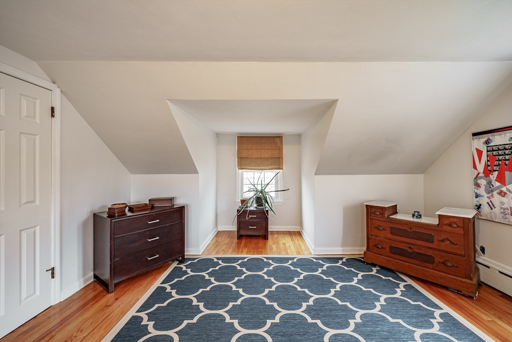 384 Forest Hills Road Springfield, MA 01128 - Photo 19 of 36 a bedroom with furniture and a window