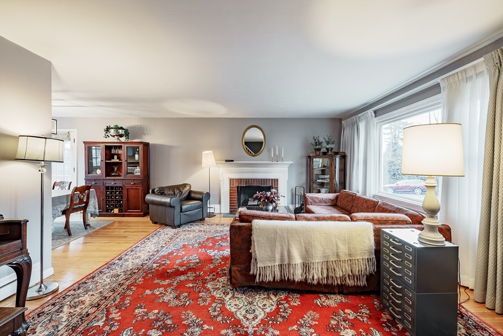 384 Forest Hills Road Springfield, MA 01128 - Photo 2 of 36 a living room with furniture and a fireplace