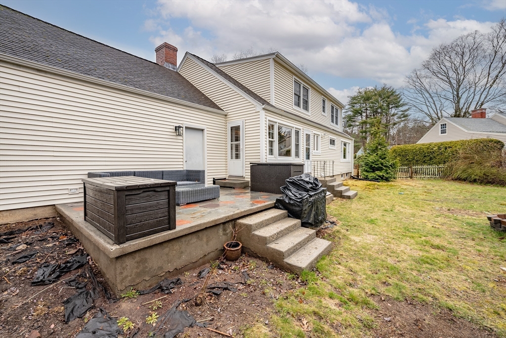384 Forest Hills Road Springfield, MA 01128 - Photo 27 of 36 a view of a yard with couches chairs and a fire pit