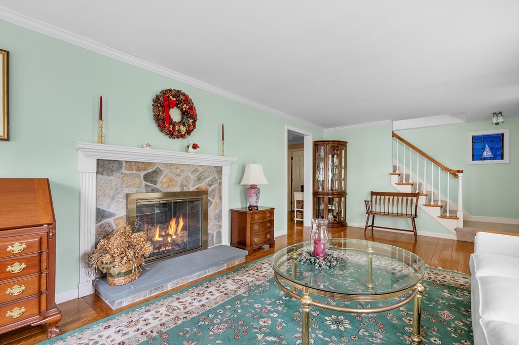 200 Sturbridge Drive Barnstable, MA 02655 - Photo 15 of 39 a living room with furniture and a fireplace