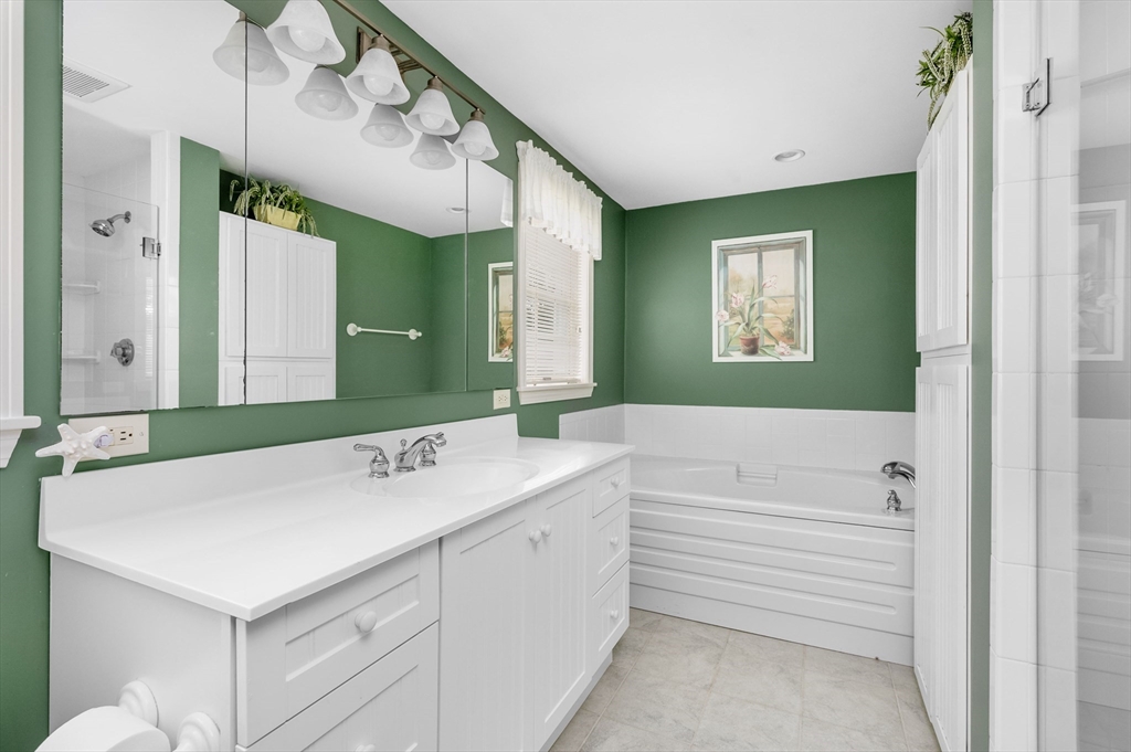 200 Sturbridge Drive Barnstable, MA 02655 - Photo 20 of 39 a bathroom with a sink and a mirror