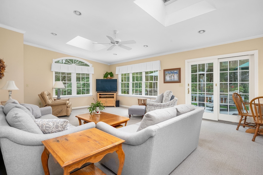 200 Sturbridge Drive Barnstable, MA 02655 - Photo 2 of 39 a living room with furniture and a large window