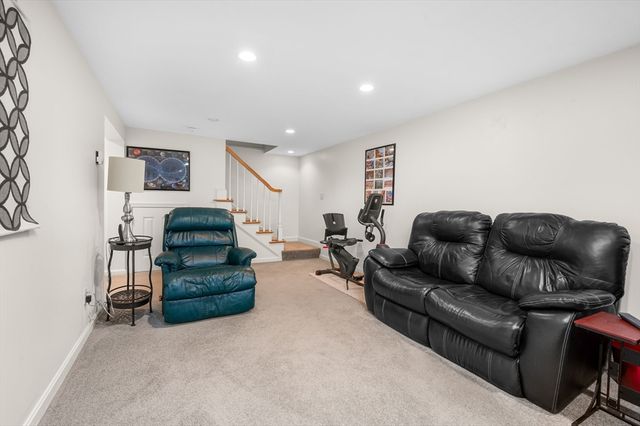 a living room with furniture and a couch