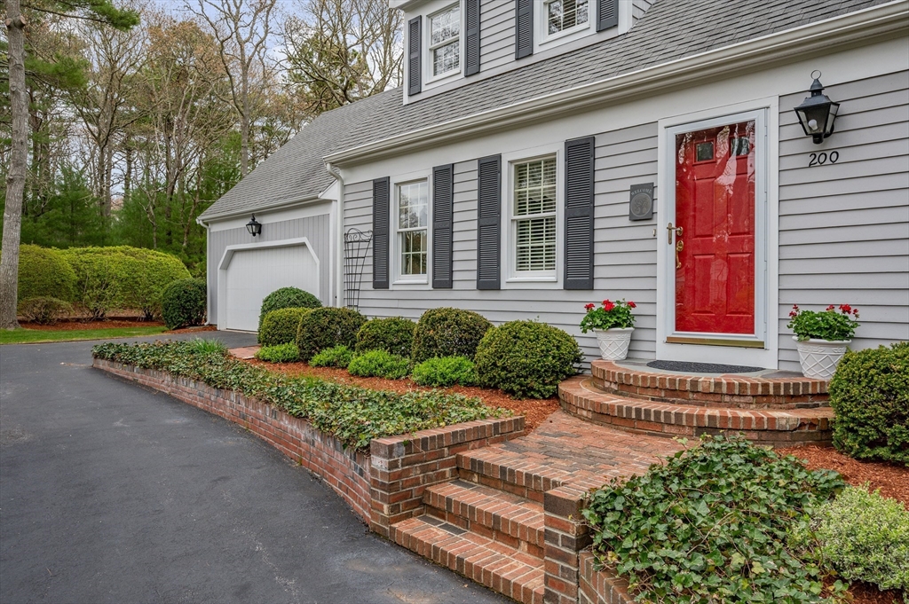 200 Sturbridge Drive Barnstable, MA 02655 - Photo 31 of 39 a front view of a house with a yard