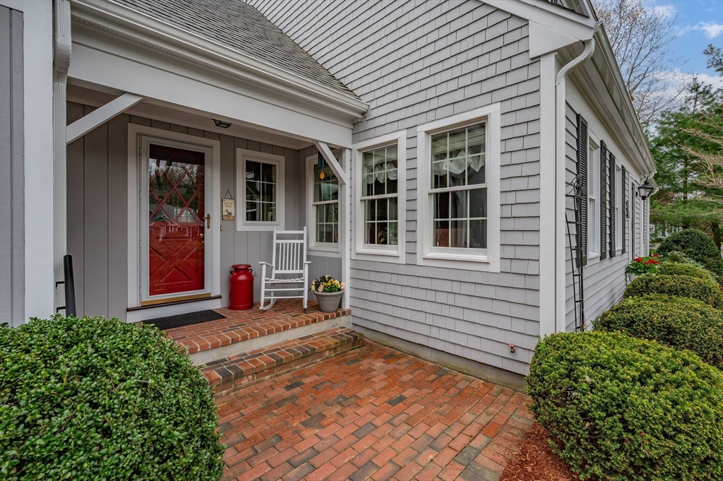 200 Sturbridge Drive Barnstable, MA 02655 - Photo 33 of 39 a front view of a house with a yard