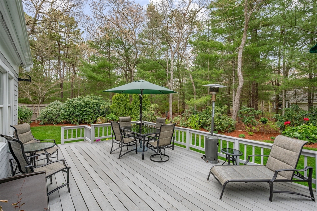 200 Sturbridge Drive Barnstable, MA 02655 - Photo 36 of 39 a view of a deck with furniture and a yard