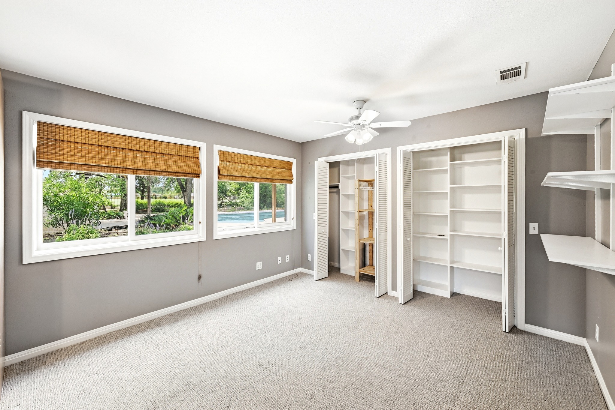 8608 Crest Ridge Circle Austin, TX 78750 - Photo 25 of 38 Well-lit room offering built-in storage and outdoor views through multiple windows.