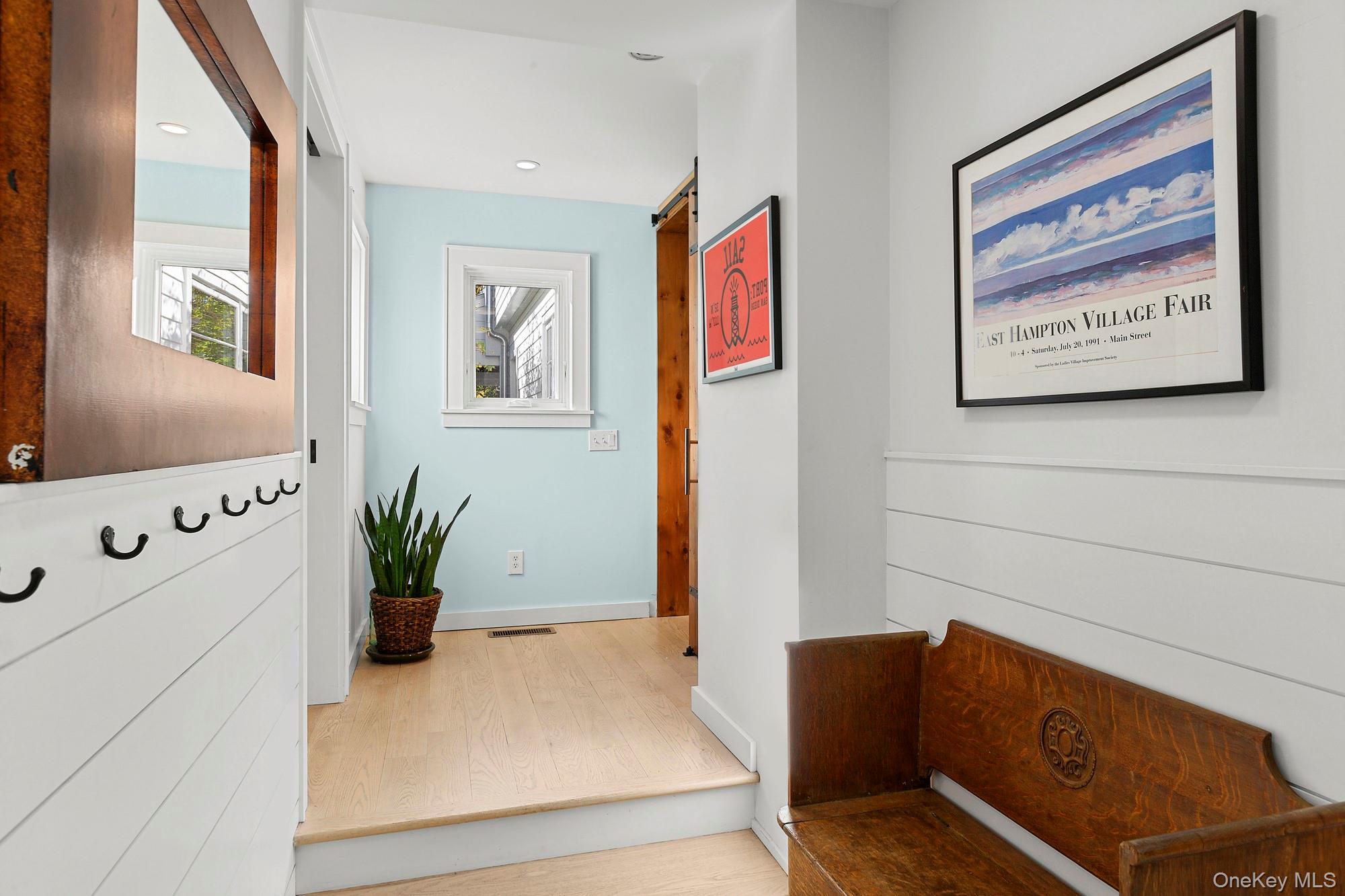 21 Cove Road Sag Harbor, NY 11963 - Photo 17 of 37 Corridor featuring light wood-style floors and recessed lighting