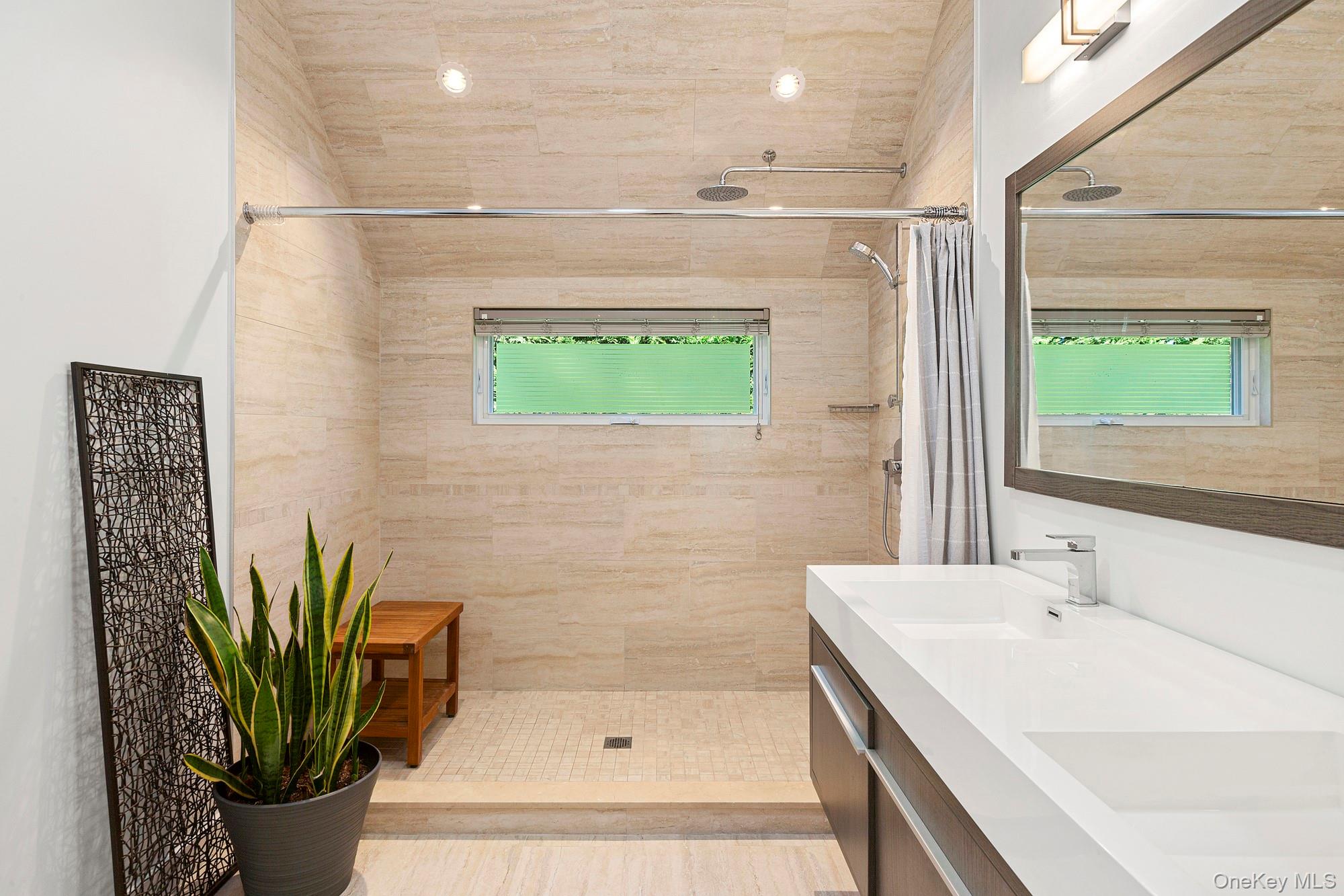 21 Cove Road Sag Harbor, NY 11963 - Photo 22 of 37 Full bathroom with double vanity and a stall shower