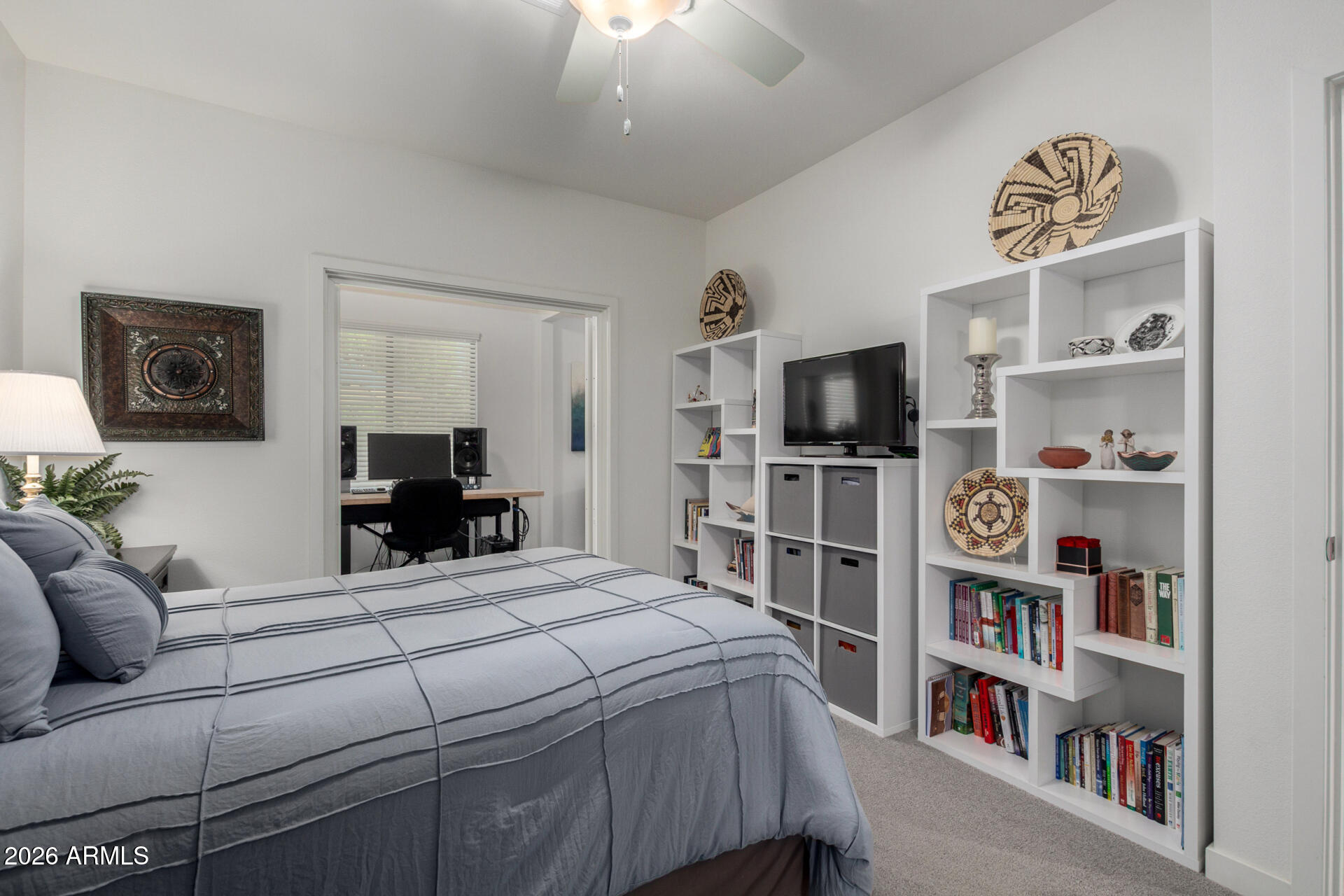2511 West Queen Creek Road, Unit 124 Chandler, AZ 85248 - Photo 13 of 39 a view of a livingroom with furniture and a flat screen tv