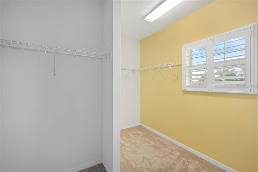 6142 Hadley Commons Drive Riverview, FL 33578 - Photo 20 of 29 a view of a small space with wooden floor and a window