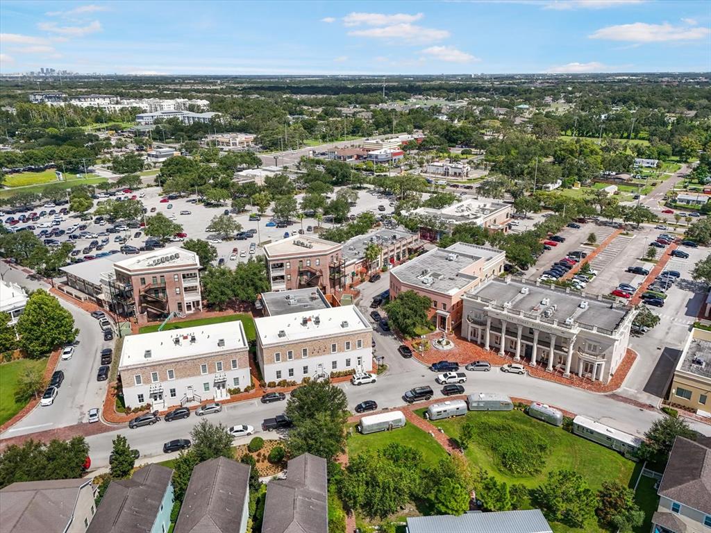 6142 Hadley Commons Drive Riverview, FL 33578 - Photo 25 of 29 an aerial view of a city with lots of residential buildings