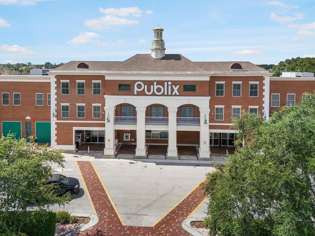 6142 Hadley Commons Drive Riverview, FL 33578 - Photo 27 of 29 front view of a building with a porch