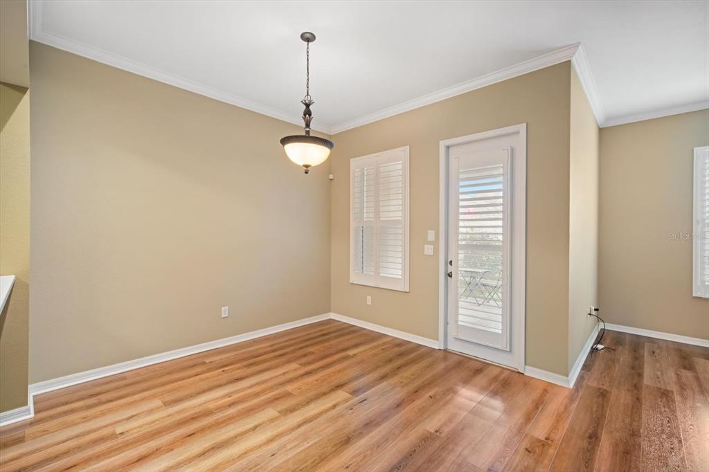 6142 Hadley Commons Drive Riverview, FL 33578 - Photo 6 of 29 a view of a room with wooden floor fan and window