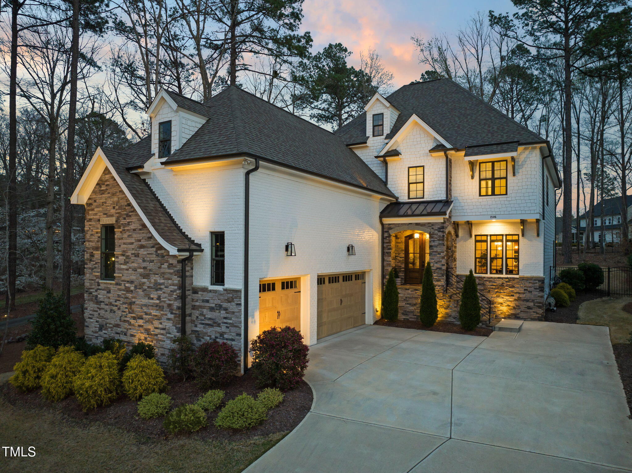 2105 Gardenbrook Drive Raleigh, NC 27606 - Photo 1 of 86 a front view of a house with a yard