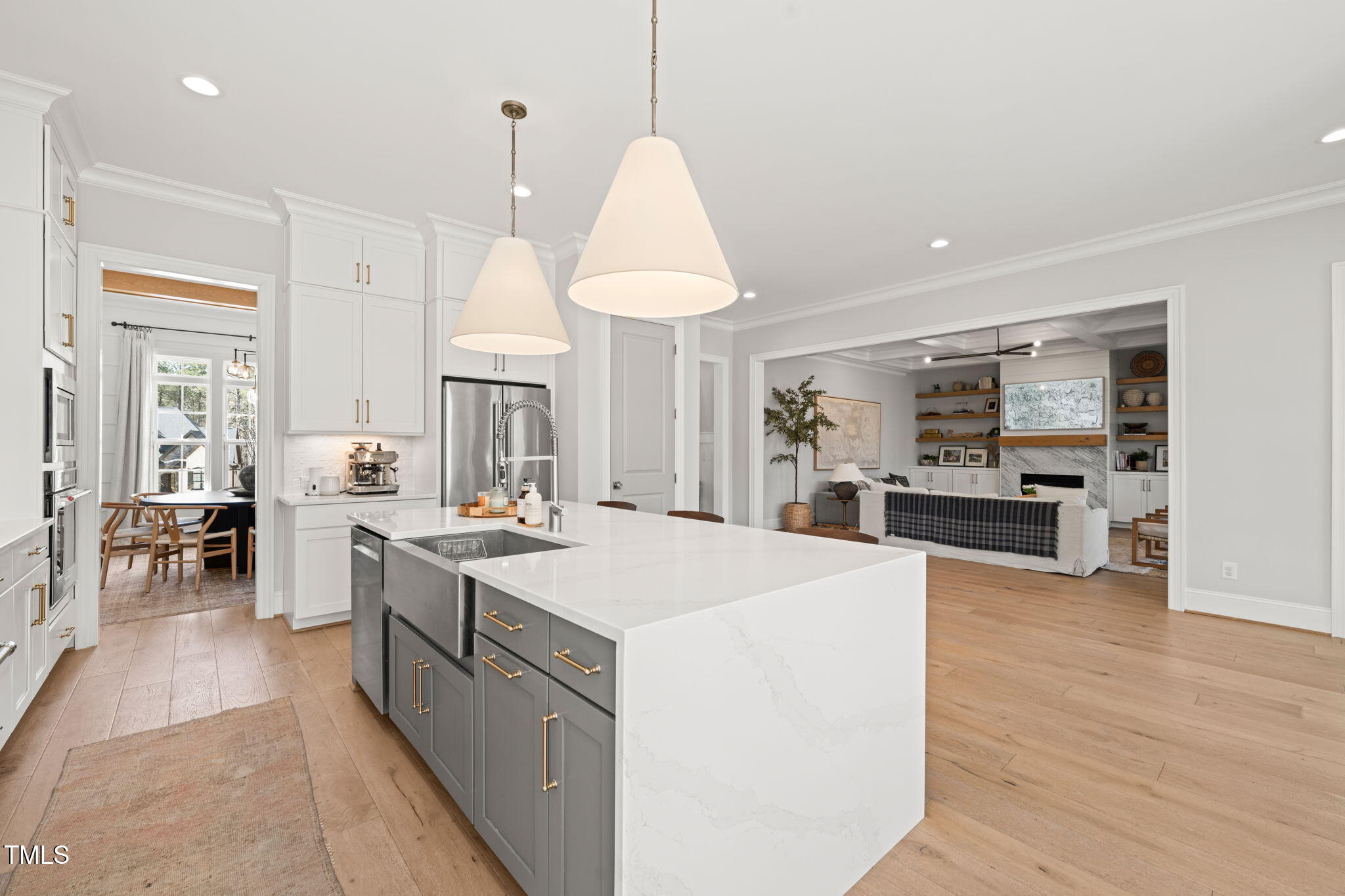 2105 Gardenbrook Drive Raleigh, NC 27606 - Photo 13 of 86 a large kitchen with kitchen island a large island in it