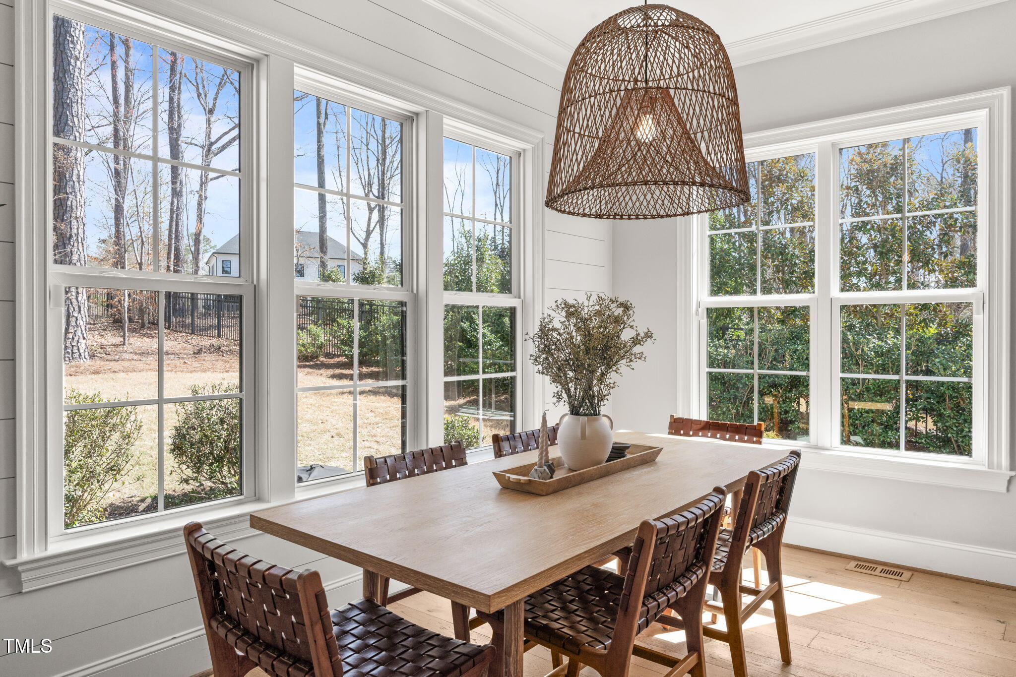 2105 Gardenbrook Drive Raleigh, NC 27606 - Photo 18 of 86 a view of a dining room with furniture window and outside view