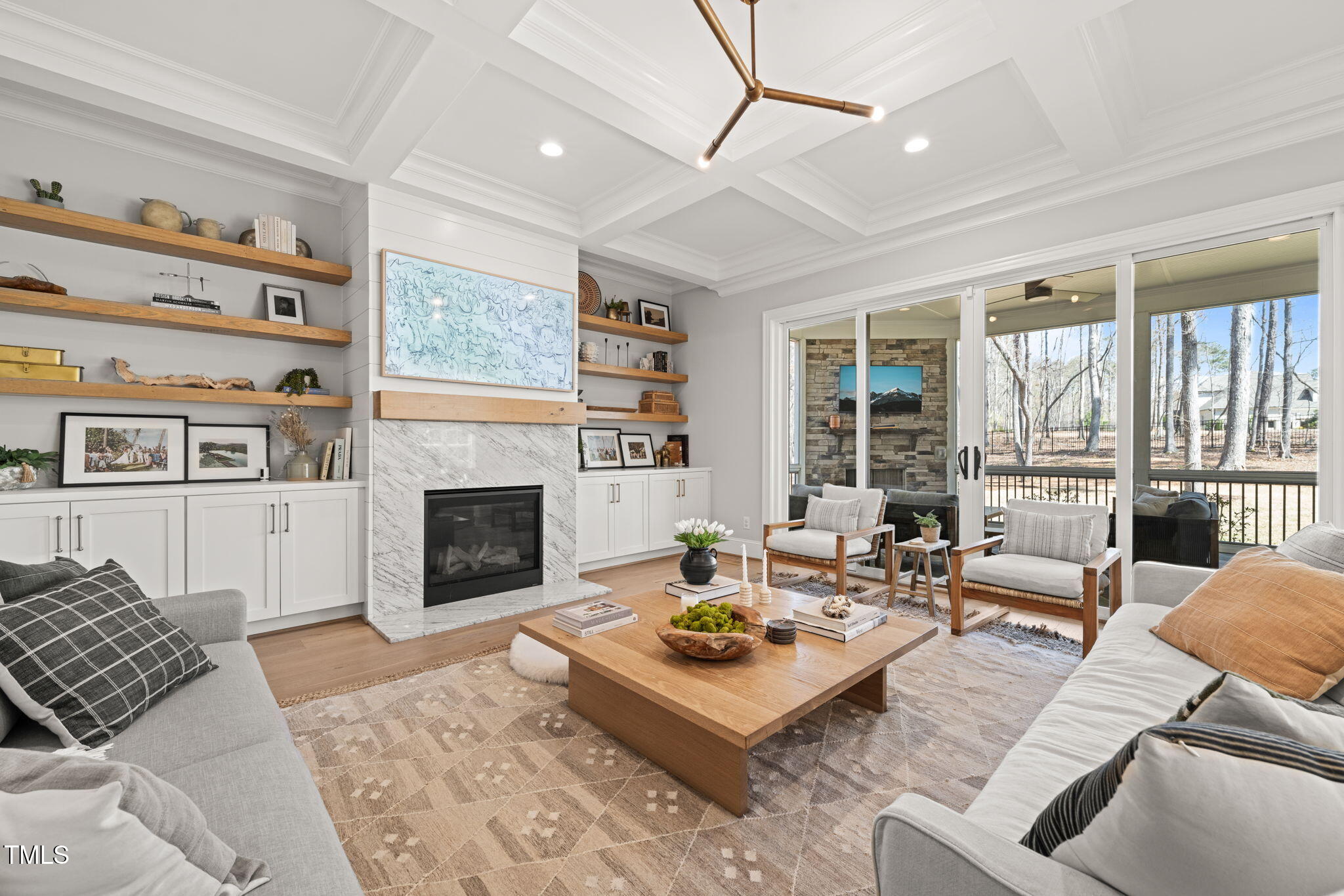 2105 Gardenbrook Drive Raleigh, NC 27606 - Photo 21 of 86 a living room with furniture fireplace and a large window