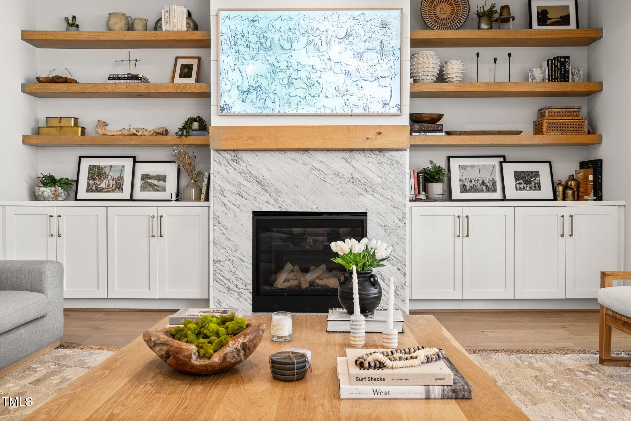 2105 Gardenbrook Drive Raleigh, NC 27606 - Photo 22 of 86 a living room with furniture and a fireplace